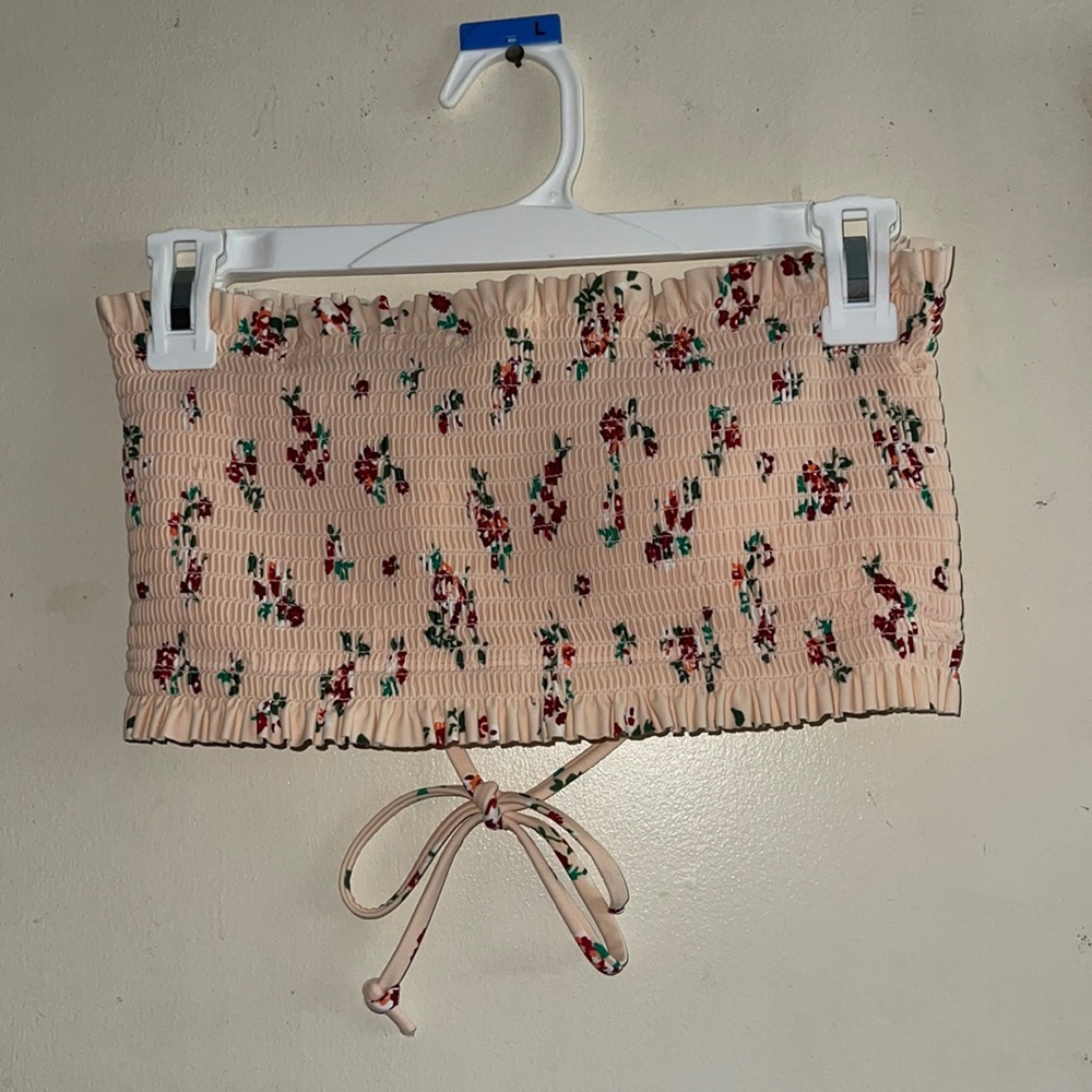 Strapless pink bathing suit top with flowers